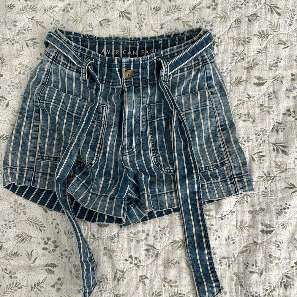Blue and white striped American Eagle cotton blend shorts featuring a belted tie